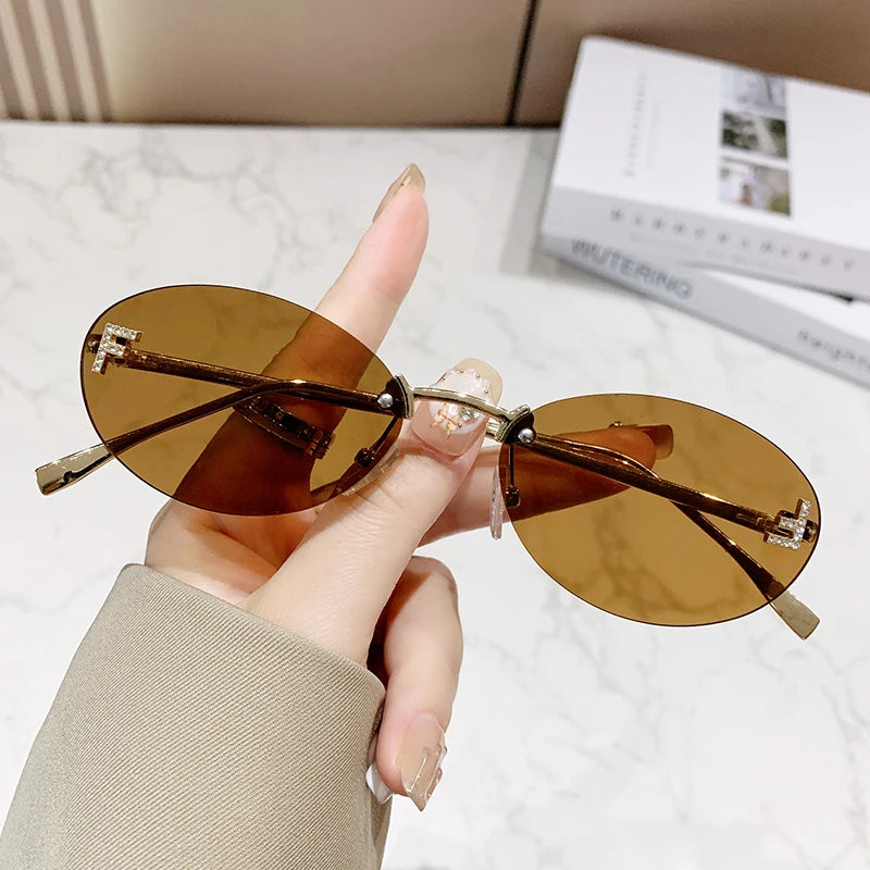 Protective Glasses Fashion Oval Rimless Design Sunglasses Female Small Size Metal Suneyeglass Outdoors Casual Vacation UV400