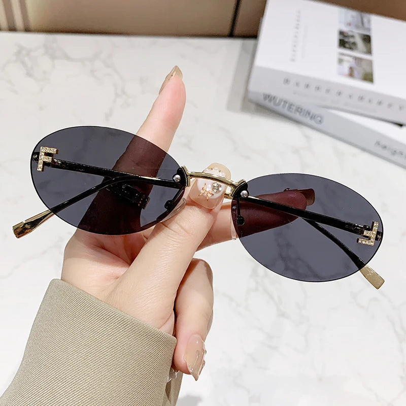 Protective Glasses Fashion Oval Rimless Design Sunglasses Female Small Size Metal Suneyeglass Outdoors Casual Vacation UV400
