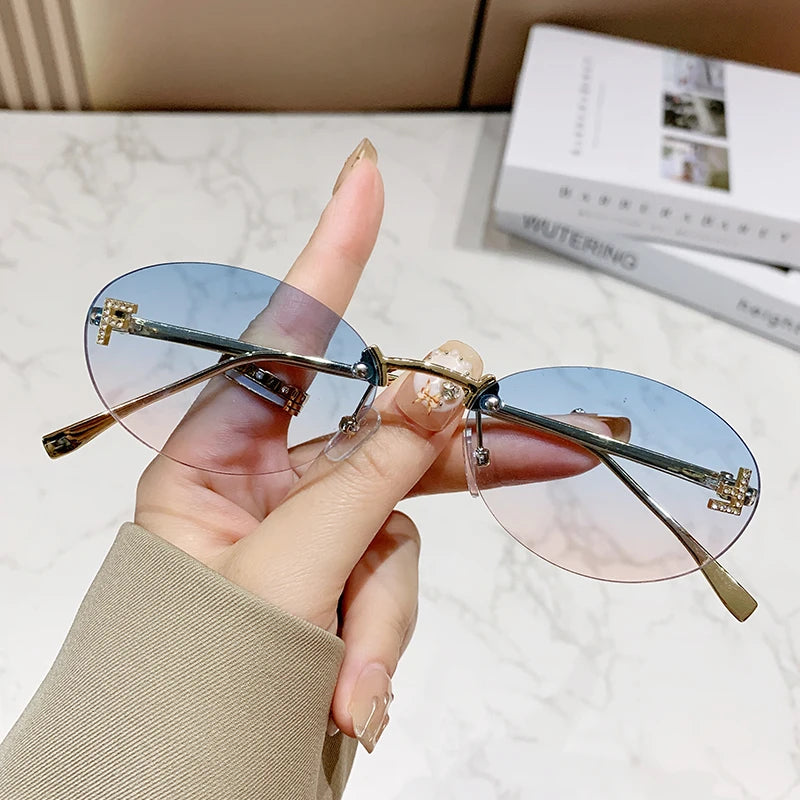 Protective Glasses Fashion Oval Rimless Design Sunglasses Female Small Size Metal Suneyeglass Outdoors Casual Vacation UV400